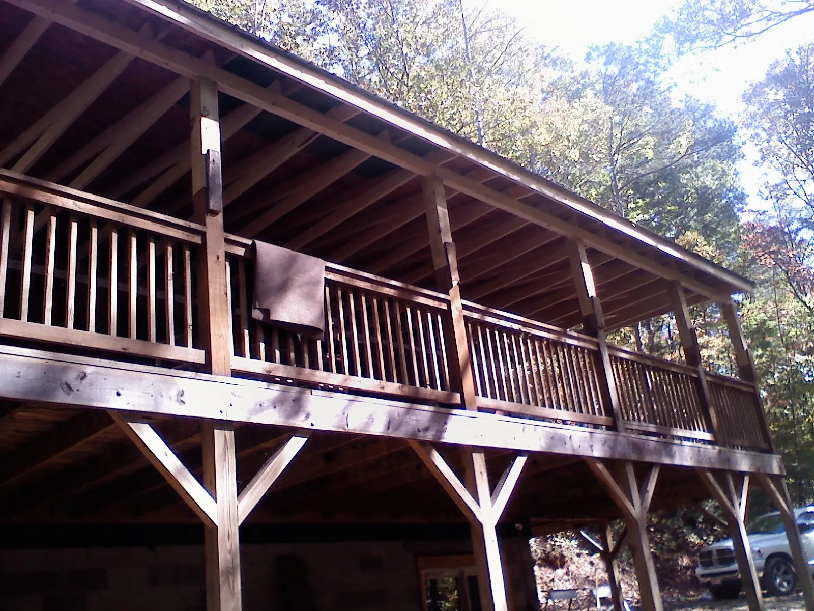 Timber framing under a new elevated porch and deck — Roof Leak Repair in Southmont by Roofing Brothers
